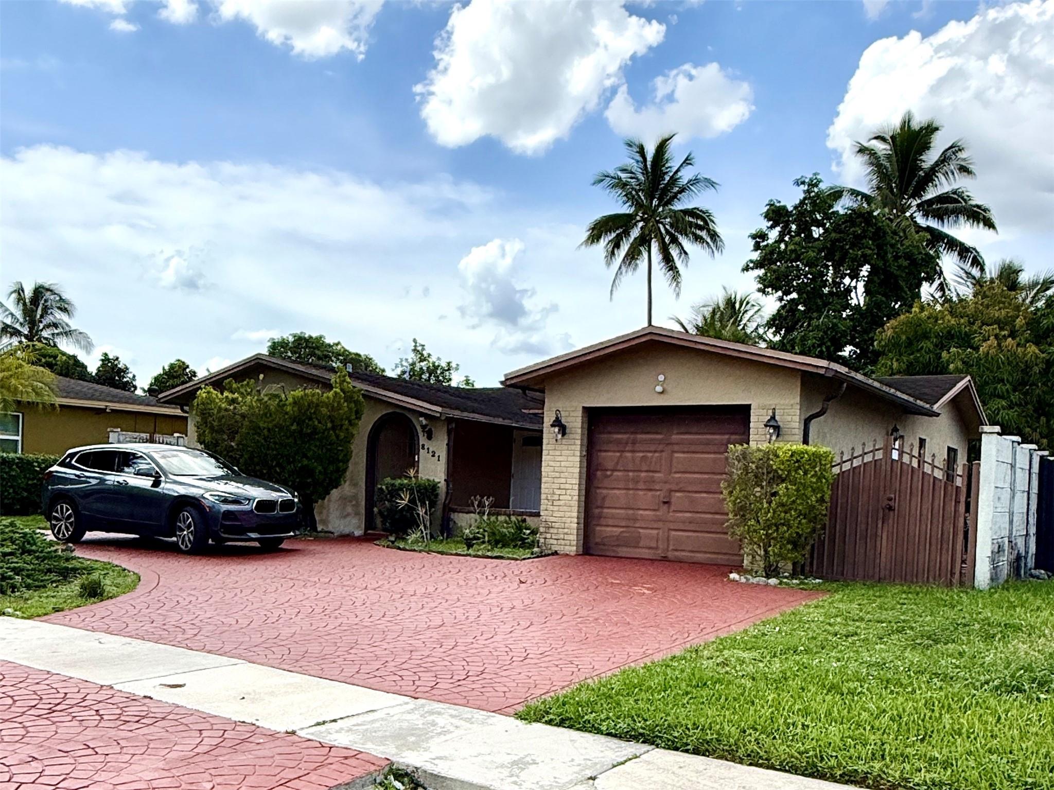Welcome to this charming home in the desirable North Lauderdale neighborhood! With 3 bedrooms and 2 bathrooms, it features an updated kitchen and bathrooms, a spacious lanai for family gatherings, and a backyard with peaceful water views. Enjoy the comfort of impact windows and a newer A/C (2017)