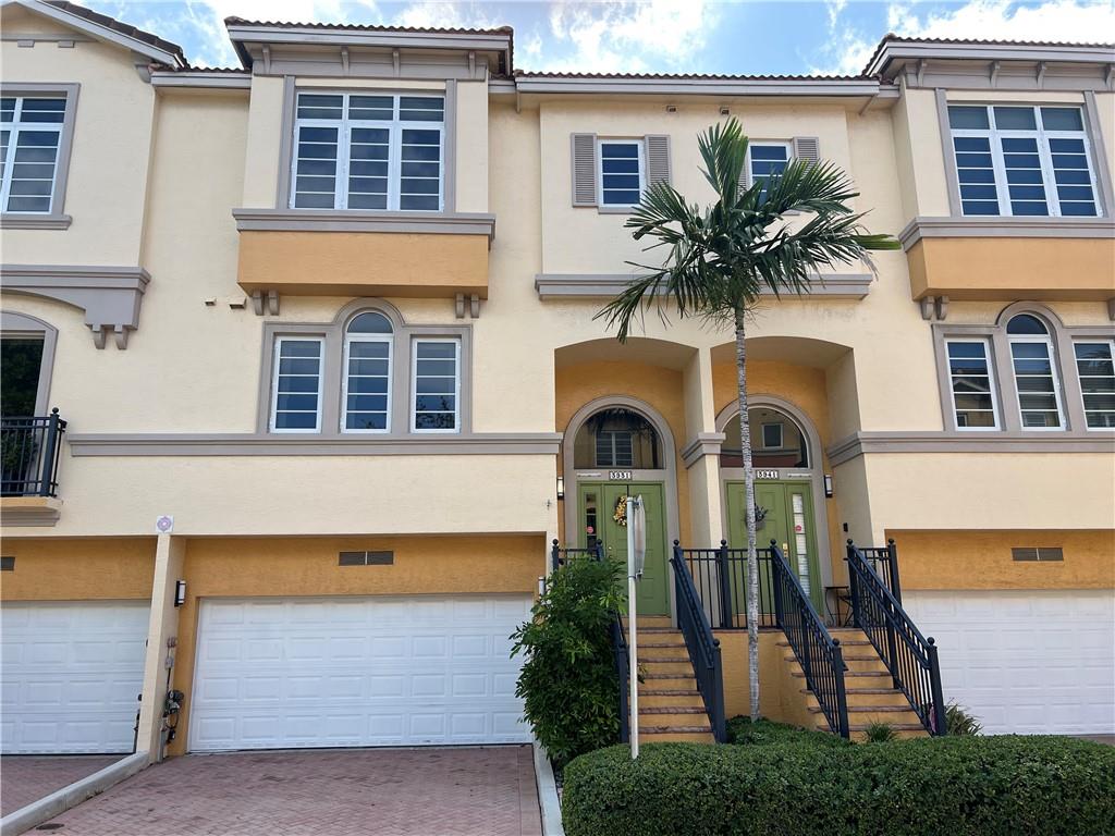 Beautiful and bright 3 bedroom 3.5 bath townhome with high ceiling and large open floor plan. Hardwood floors and tile throughout the unit. 2 Car Garage with lockable storage area in the garage and room to park in the driveway. The Villas of Coral Heights is a wonderful neighborhood with a great community pool, clubhouse area and guest parking.
