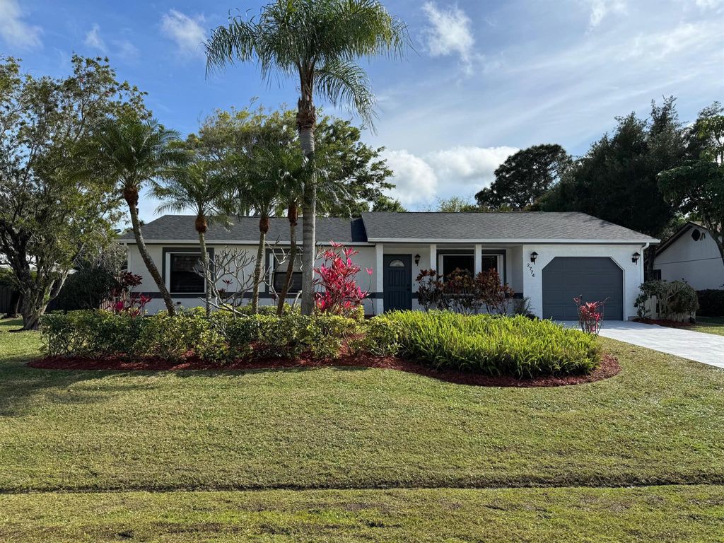 Photo of 2774 SE Brevard Avenue, Port Saint Lucie, FL 34952 (MLS # R10966100)