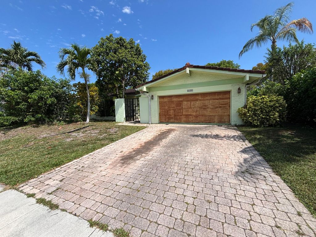 Photo of 2753 NW 34th Street, Boca Raton, FL 33434 (MLS # B26022605)