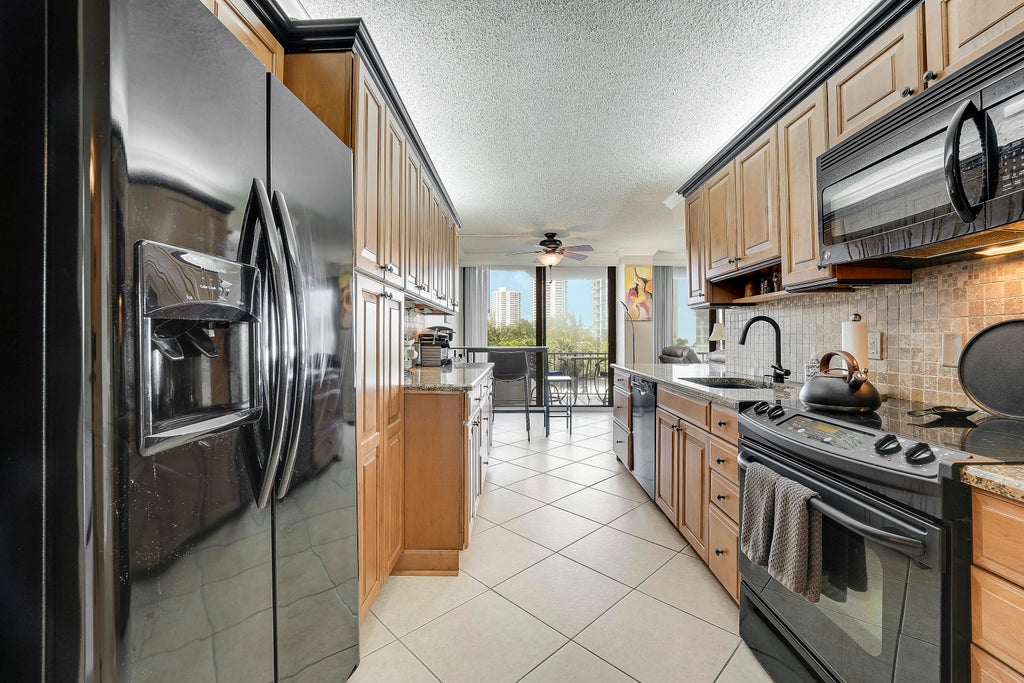 Photo of 4200 N Ocean Drive #2-306, Riviera Beach, FL 33404 (MLS # B26039256)