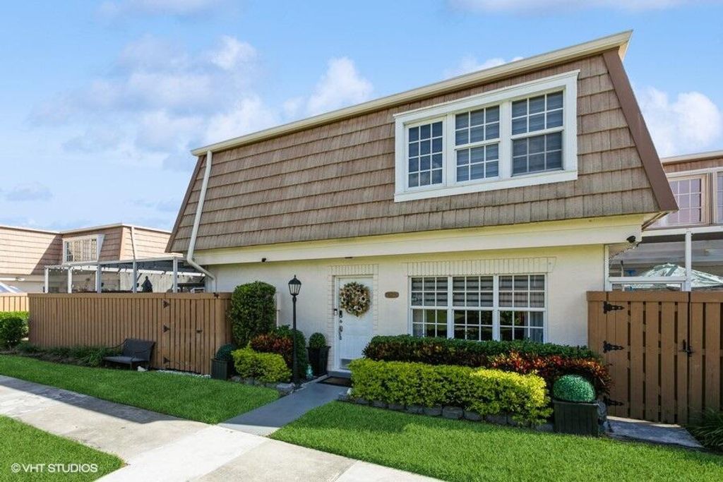 Photo of 11625 Winchester Drive #C, Palm Beach Gardens, FL 33410 (MLS # R10937541)