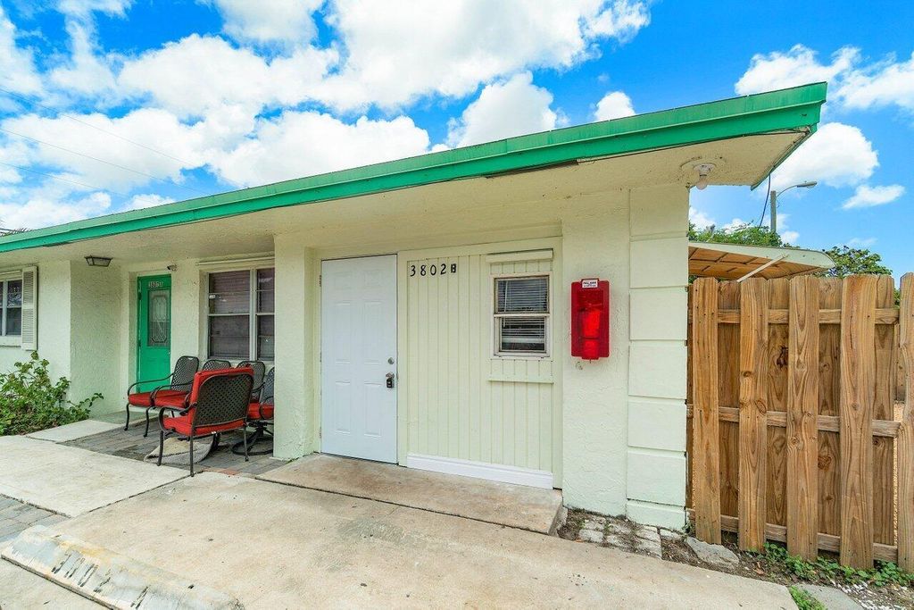 Photo of 3802 Melaleuca Lane #B, Lake Worth, FL 33461 (MLS # R11000426)