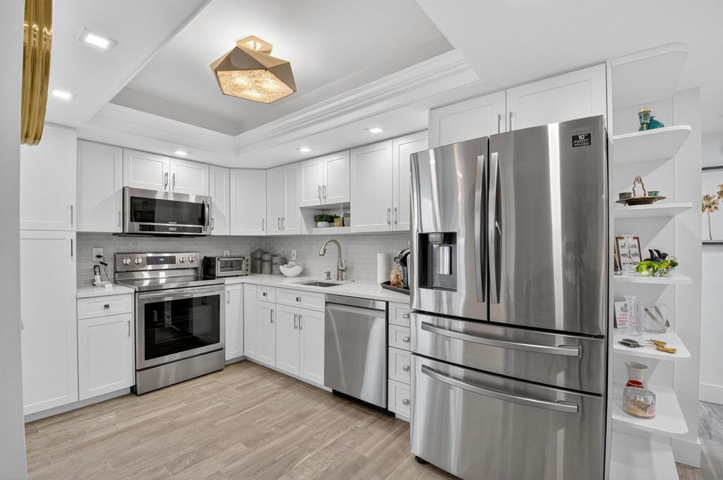 Photo of 6815 Willow Wood Drive #4062, Boca Raton, FL 33434 (MLS # R11113896)