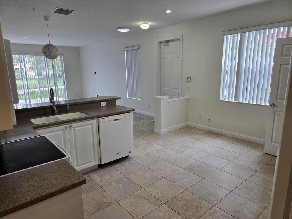 Photo of 1111 Pinewood Lake Court, Greenacres, FL 33415 (MLS # B26004677)