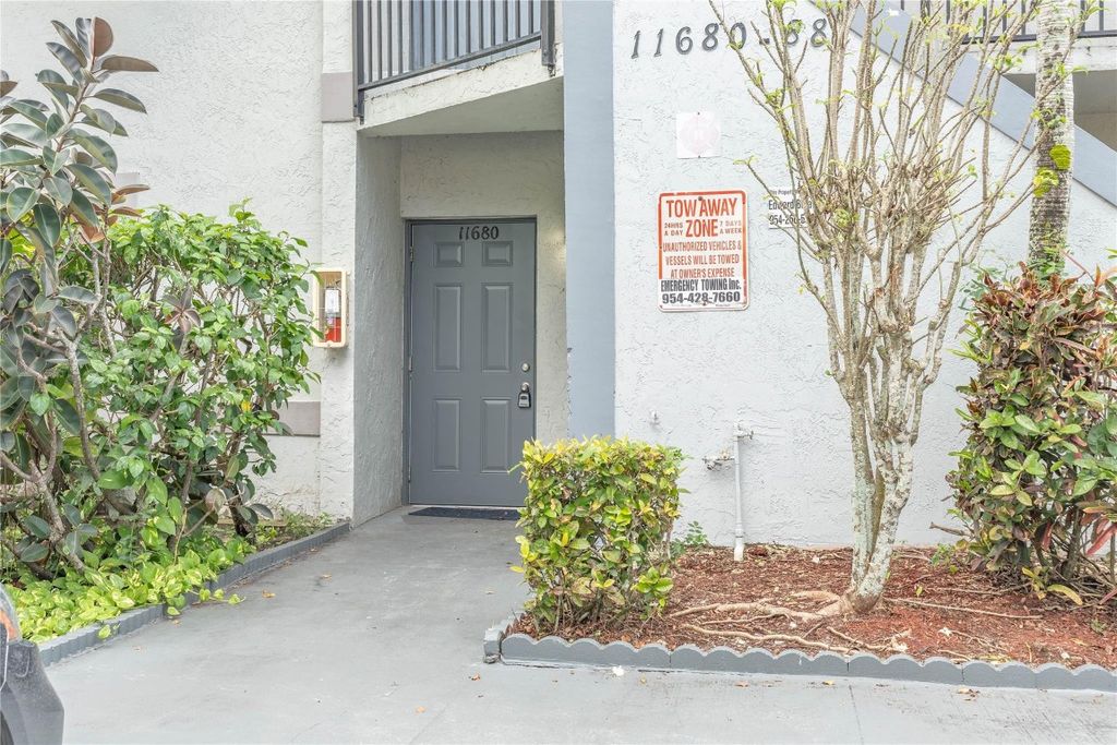 Photo of 11680 NW 39th Street, Coral Springs, FL 33065 (MLS # F10539412)