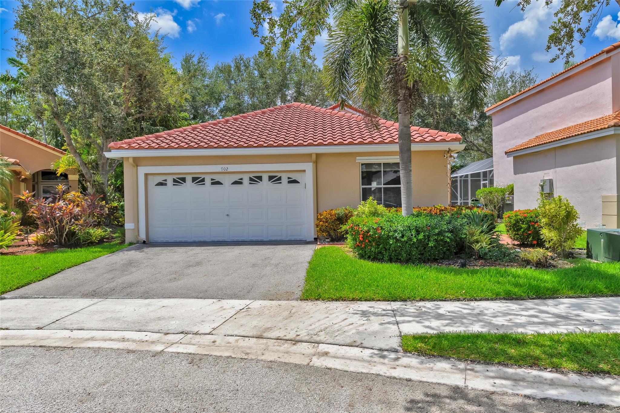 Welcome to this bright and spacious 3 bedrooms 2 bathrooms home, located in one of Weston’s most desirable gated communities, North Lakes. Bring your personal touch and style to make this home your own! Newer Roof 2017, new water heater. Featuring an open floor plan, vaulted ceilings , newer kitchen with wood cabinetry, granite countertops, stainless steel appliances, washer and dryer conveniently located inside the house, title floors throughout, comfortable living area perfect for family gatherings. Enjoy the tranquil garden views from your screened in patio, the community pool, playground and the beautiful landscape surroundings. Walking distance to A+schools, restaurants and shopping. Easy access to main roads and highways, all the convenience with the charm of Weston living!