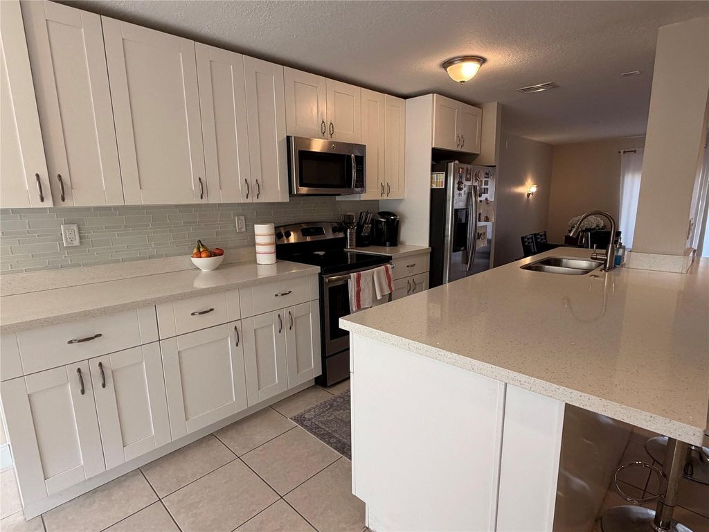 Photo of 8251 NW 8th Place, Plantation, FL 33324 (MLS # F10543570)