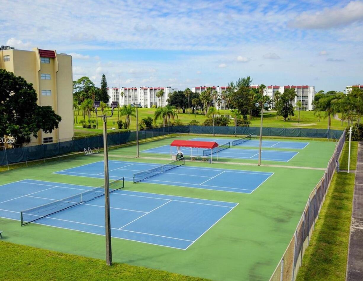 POINCIANA PLACE CONDO A,B AND C - Residential