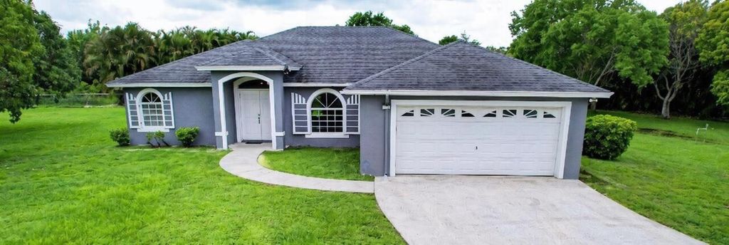 Photo of 13564 N 63rd Ln Lane N, The Acreage, FL 33412 (MLS # B26019358)