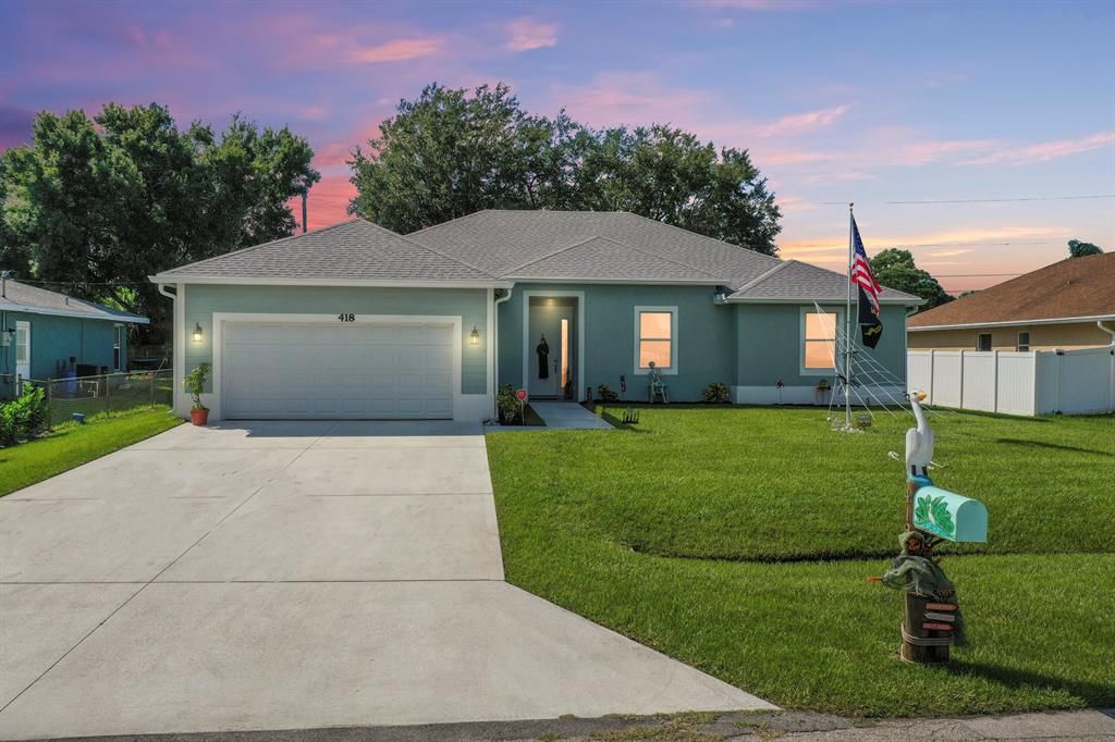 Photo of 418 SW Lakota Avenue, Port Saint Lucie, FL 34953 (MLS # R10749958)