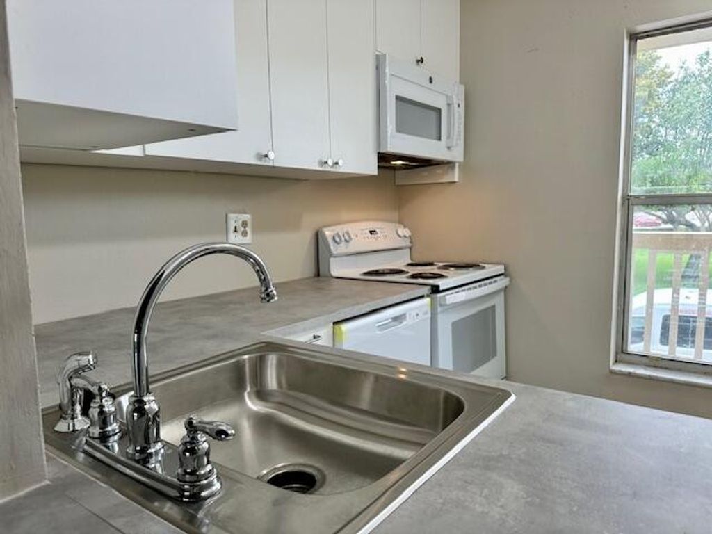 Photo of 6020 NW 64th Avenue #207, Tamarac, FL 33319 (MLS # B26025147)