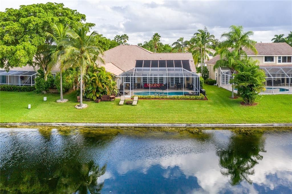 Photo of 1170 Laguna Springs Drive, Weston, FL 33326 (MLS # F10552652)