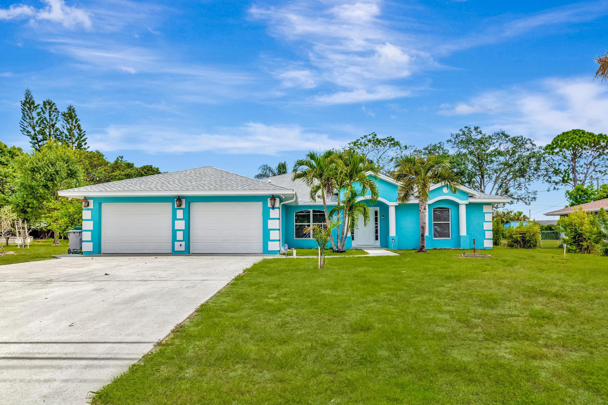 Immaculate 3-BR, 2-BA CBS home in the heart of Port St. Lucie with option to purchase the adjacent lot for a combined 0.58 acres! Built in 2004, 1972 sq ft living area, home offers open floorplan for everyday comfort & entertaining flowing seamlessly from formal living & dining rooms to the family room & spacious kitchen into the enclosed 260 sq ft Florida room. New roof (2025), Fresh Paint, Tile flooring throughout. Oversized 570 sq ft 2-car garage has room for toys & tools, storage shed, city water, sewer, & natural gas available. Bonus: County-only taxes. This gem is conveniently located near shopping, dining, parks, schools. Short drive to Treasure Coast beaches, golf courses. Public boat ramp for boating on the St. Lucie River. Incredible flexibility for families, hobbyists, boaters.