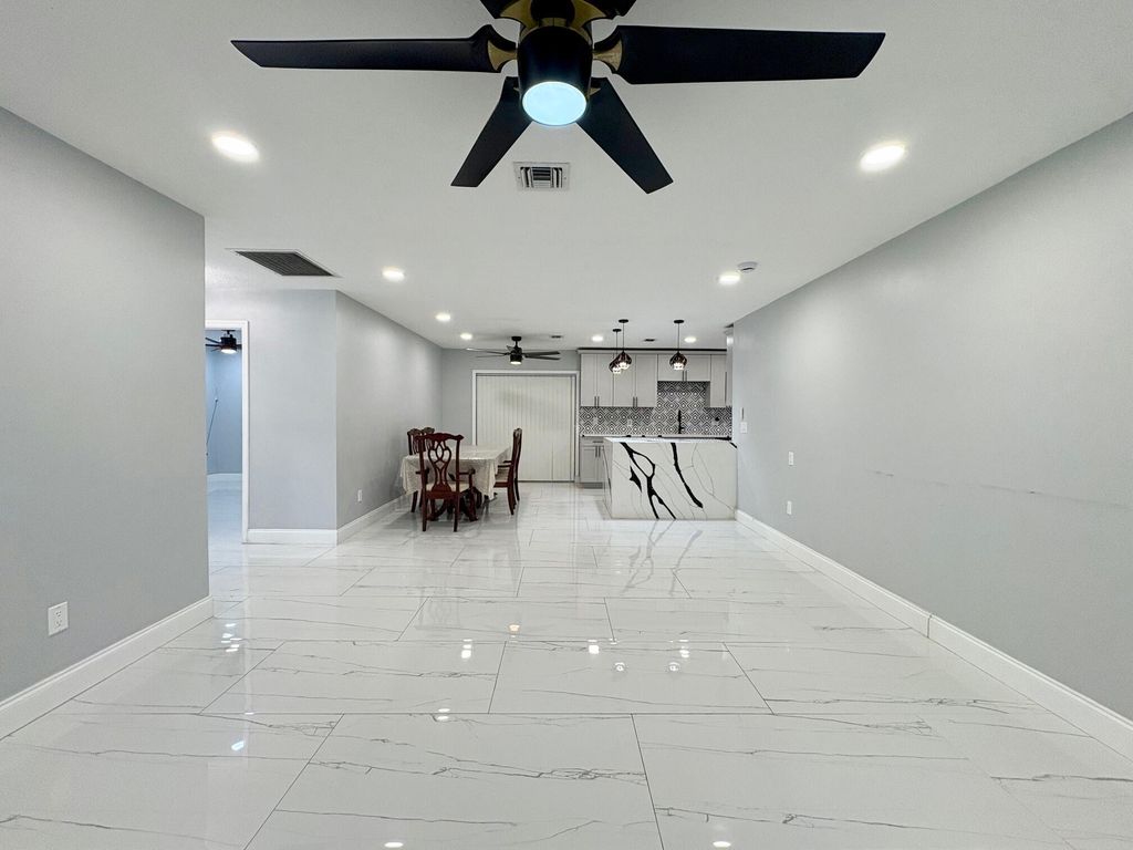 Photo of 1733 Sunset Avenue, Lake Worth Beach, FL 33460 (MLS # R11144706)