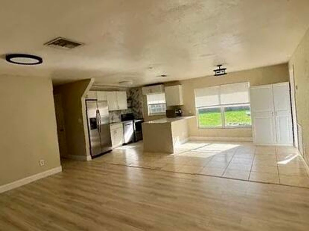 Photo of 2831 NE Savannah Road, Jensen Beach, FL 34957 (MLS # B26020494)