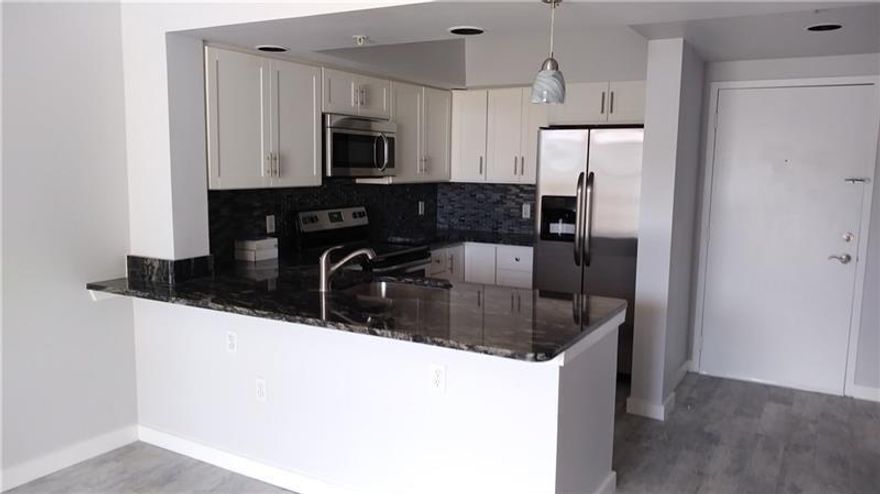 RENOVATED 1 BEDROOM WITH TONS OF STORAGE AND AN EXTENDED BALCONY, FULL-SIZED WASHER/DRYER IN THE UNIT.  THE WAVERLY HAS SO MANY UPDATED AMENITIES. NEW LOBBIES, ELEVALTORS, MAILBOXES, PM ROOM WITH POOL TABLE, PING PONG TABLE, FOOSBALL TABLE, MOVIE THEATER, KITCHEN, ETC. THERE ARE SHOPPING CARTS ON EVERY GARAGE LEVEL, CAR VACCUM/AIR FOR TIRES ON 4TH FL., BIKE STORAGE ROOM, BBQ GRILLS ON POOL DECK. LOCATED 5 MINUTES FROM I95, 5 MINUTES FROM 595, 5 MINUTES TO THE BEACH, 10 MINUTES TO THE AIRPORT, ADDRESS IS ELIGIBLE FOR BEACH PARKING PERMIT ($75/YR + TAX). RENTERS INSURANCE IS REQUIRED.