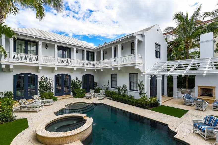 Gorgeous in-town British Colonial with open floor plan, library, and 5BR/6.2BA extending to main and guest house. Gourmet eat-in chef's kitchen with adjacent family room leads to fantastic pool, spa, and loggia with fireplace and summer kitchen. Perfect for entertaining with oversized living room, foyer, and dining room. Built in 2010, this home features 7,777 +/- total square feet with high ceilings, elevator, fireplaces, walk-in pantry, 2 car garage, and beautiful detailed millwork. Spacious master wing with fireplace, balcony, wet bar, and dual baths and walk-in closets.