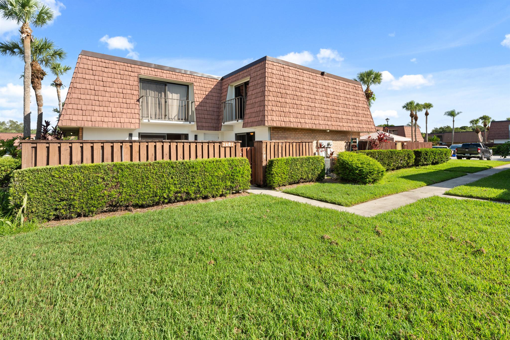 Lake side view Move-in ready and remodeled, this 2-bedroom, 2.5-bath townhome is located in one of Palm City's most sought-after and affordable gated communities. Step inside to find brand-new vinyl plank flooring throughout, New carpet, new front door and keypad with patio lights. A stunning updated kitchen with quartz countertops and new stainless steel fridge. All new ceilings and lights. Nice bathrooms with new toilets and modern finishes. Enjoy the community pool--one of two in the neighborhood. Sunset Trace also offers a wealth of amenities, including tennis courts, basketball courts, a tot lot, and 24-hour manned security.Zoned for top-rated schools and ideally located close to I-95 and the Florida Turnpike, this home combines comfort, style, and unbeatable value.