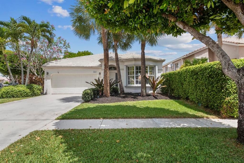 Photo of 7665 Rockport Circle Cir, Lake Worth Beach, FL 33467 (MLS # R10793138)