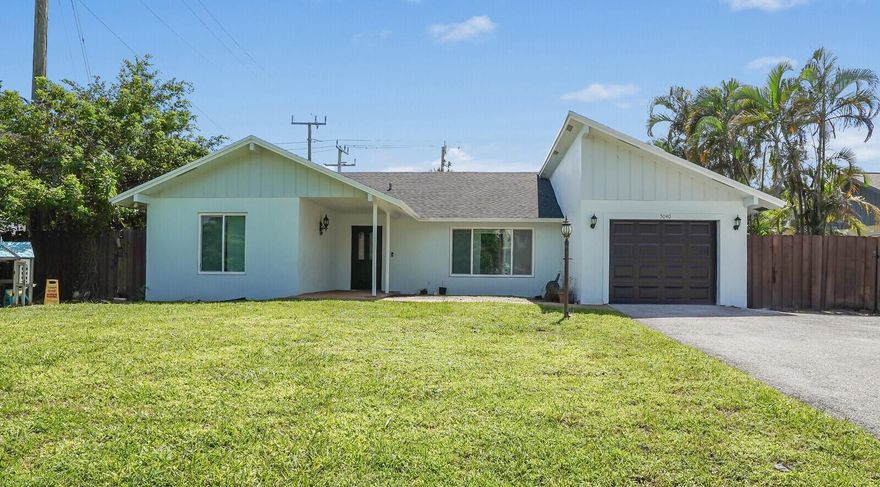 Beautifully updated home offers an inviting open floor plan & soaring vaulted ceilings, creating a bright, airy atmosphere. Located in the heart of Delray Beach, just minutes from the vibrant Atlantic Avenue, beaches, trendy shopping plazas, and bustling farmer's markets. With no HOA, enjoy ultimate freedom & privacy.The spacious interior features tile flooring throughout and fully updated kitchen, complete with brand-new 2025 stainless steel appliances and granite countertops. For added convenience, new LG washer and dryer (2025) are included.Large fenced private backyard perfect for entertaining, along with an oversized driveway offering ample parking space. With a brand-new roof, impact windows and fresh exterior paint, this home is worry-free!