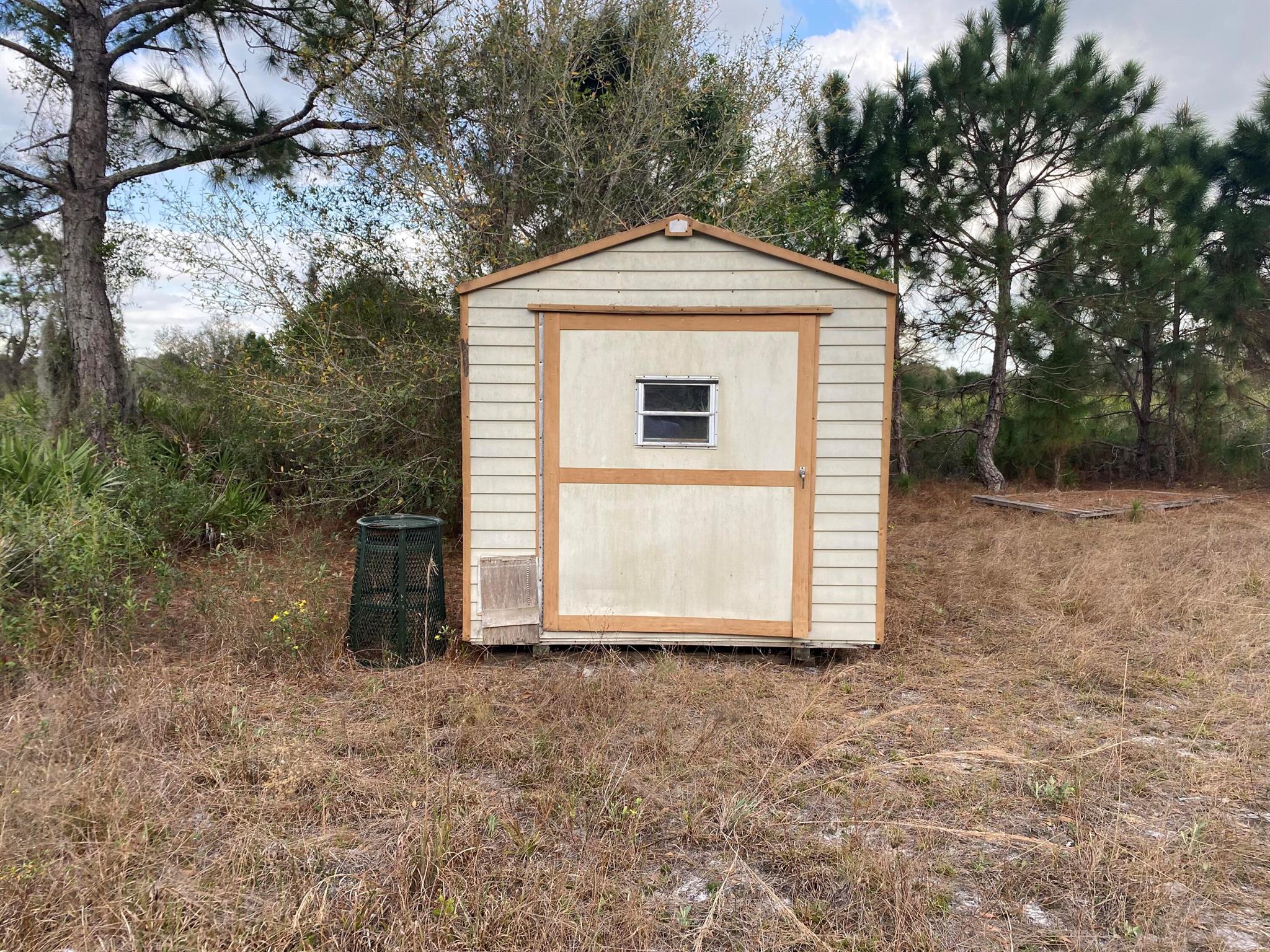 Build or bring your dream home and barn on this beautiful and private HIGH AND DRY semi clear 1.25-acre lot with some oak trees large enough so you can bring your animals too. With power poles on this street. total privacy. The shed on the property is included in the sale also the property was previously surveyed and can provide previous survey There is so much to enjoy in Okeechobee County. Come to The Kissimmee River Preserve State Park West of this area as well is the Kissimmee River. The Kissimmee River flows into Lake Okeechobee and is well known for some of the best fishing. whether you like Fishing, hunting, mudding agriculture or just privacy here you have it all. Financing available