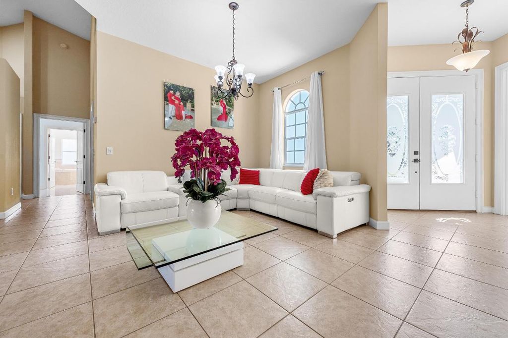 Photo of 2396 SW Pamona Street, Port Saint Lucie, FL 34953 (MLS # R11108183)