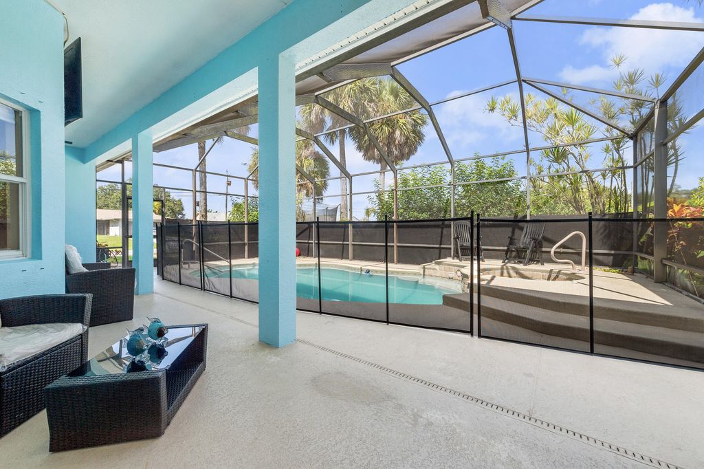 Photo of 2396 SW Pamona Street, Port Saint Lucie, FL 34953 (MLS # R11108183)