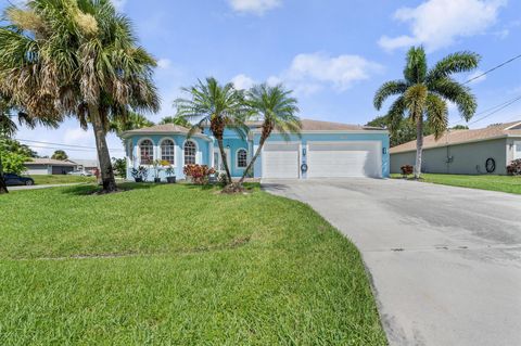 Photo of 2396 SW Pamona Street, Port Saint Lucie, FL 34953 (MLS # R11108183)