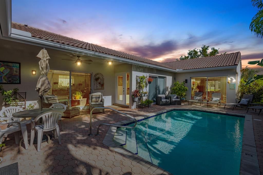 Photo of 9623 Orchid Grove Trail, Boynton Beach, FL 33437 (MLS # R10738509)