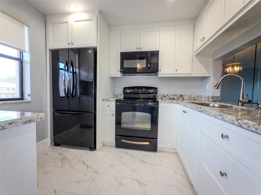 Photo of 10332 Sunrise Lakes Boulevard #310, Sunrise, FL 33322 (MLS # F10552069)