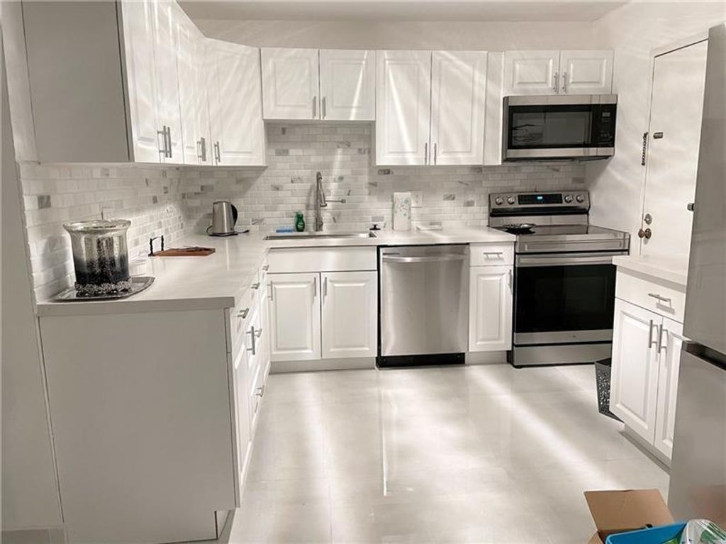 Photo of 3740 Inverrary Dr #3t, Lauderhill, FL 33319 (MLS # F10355210)