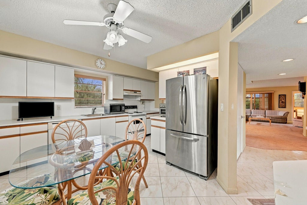 Photo of 1704 ANDROS Isle #A3, Coconut Creek, FL 33066 (MLS # B26092192)