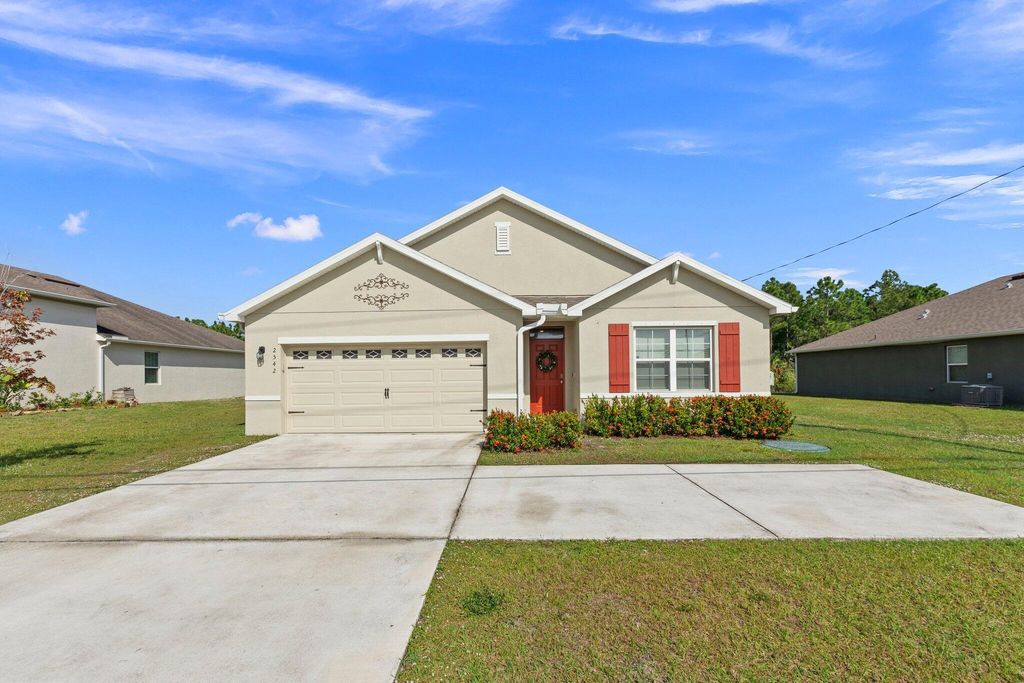 Photo of 2542 SW Savage Boulevard, Port Saint Lucie, FL 34953 (MLS # R11078302)