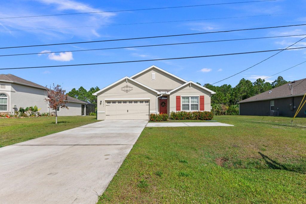 Photo of 2542 SW Savage Boulevard, Port Saint Lucie, FL 34953 (MLS # R11078302)