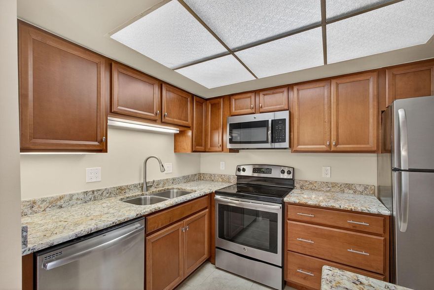 Charming 2/2 condo in Palm Beach.  This affordable condo is move-in ready or lease immediately!  Great purchase for a year-round tenant, a snowbird or an investor!  Enjoy the serene sounds of nature on your enclosed screened porch equipped with roll-down hurricance shutters. Washer/Dryer utility closet on patio. Community amenities include a clubhouse, swimming pool, tennis courts, and a picnic area.   No dogs allowed.  Priced to sell come see this darling gem!