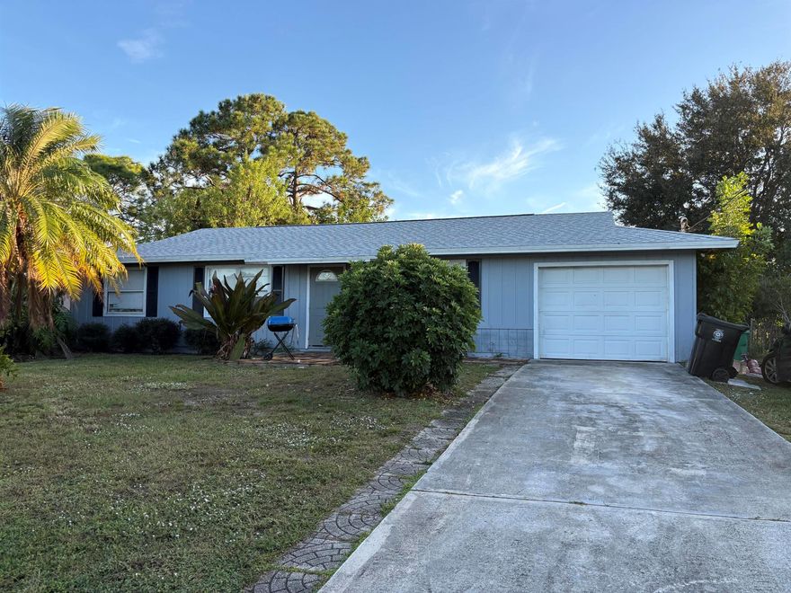 This 3-bedroom, 2-bath home with a 1-car garage features tile flooring throughout and is located in the heart of Port St. Lucie. The open layout includes newer appliances (washer and dryer not included) and a spacious, fenced backyard with fruit trees. Conveniently situated near dining, shopping centers, grocery stores, beaches, and just minutes from both the Turnpike and I-95, perfect for commuters. The owner may consider a buyer closing-cost allowance with the right offer. Don't miss out on this charming home!