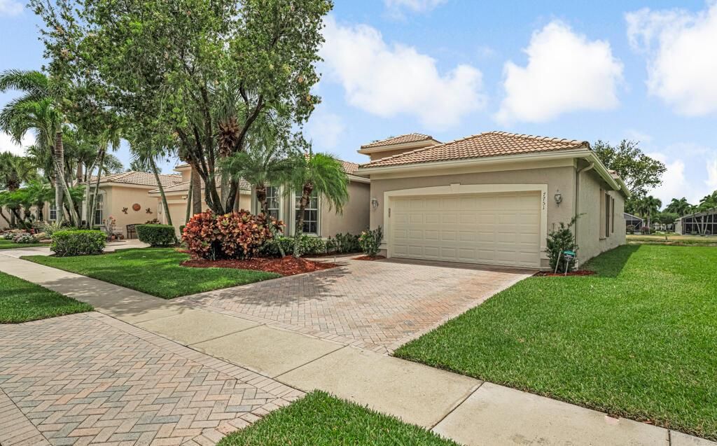 Photo of 7751 Ocean Sunset Drive, Lake Worth, FL 33467 (MLS # R11087942)