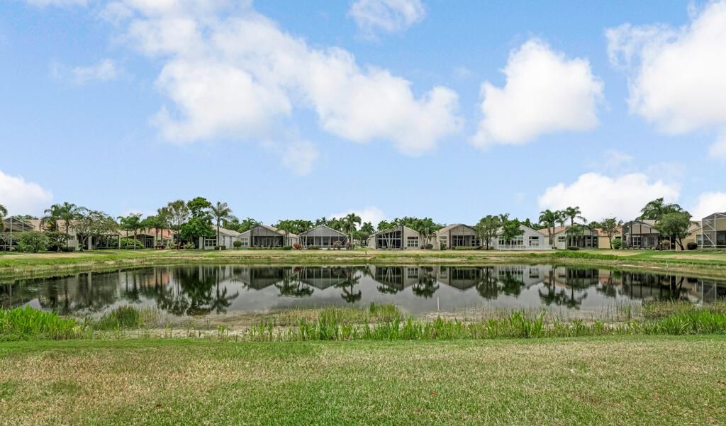Photo of 7751 Ocean Sunset Drive, Lake Worth, FL 33467 (MLS # R11087942)