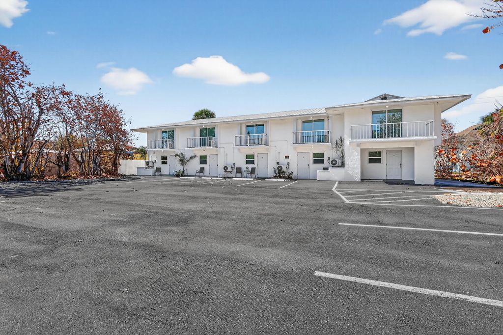 Photo of 2305 Tamarind Drive #9, Fort Pierce, FL 34949 (MLS # B26003140)