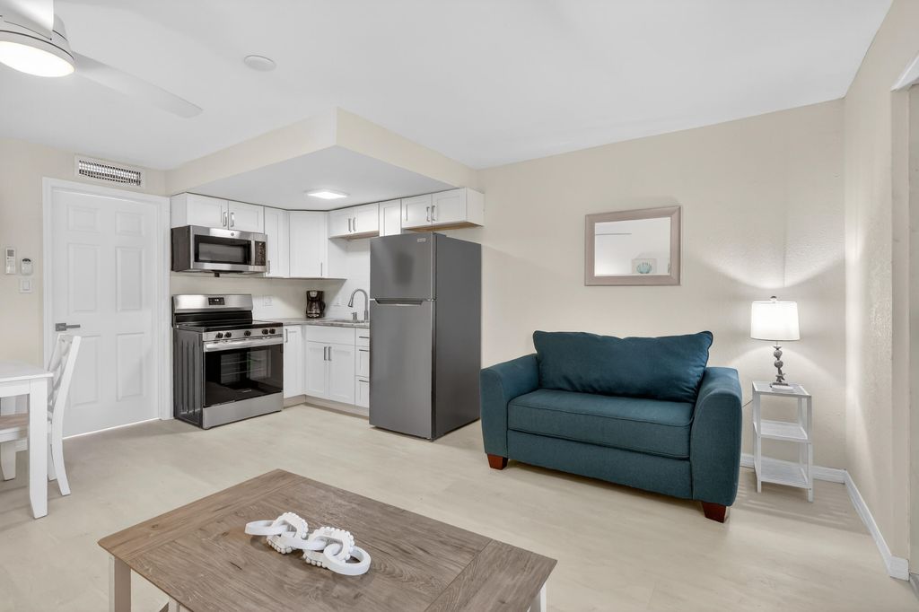 Photo of 2305 Tamarind Drive #9, Fort Pierce, FL 34949 (MLS # B26003140)