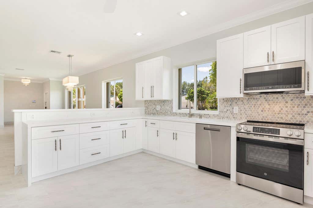 Photo of 9119 Bay Point Circle, West Palm Beach, FL 33411 (MLS # B26061498)