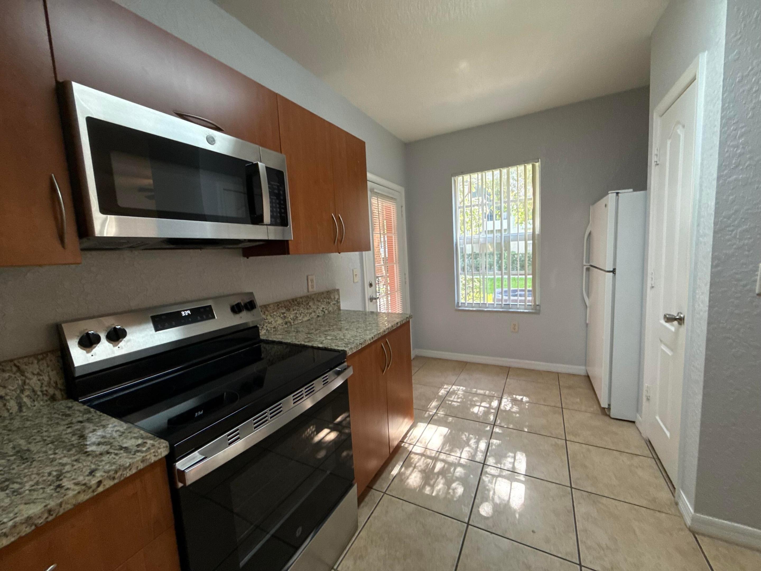THE BELMONT AT ST LUCIE WEST, A CONDOMINIUM - Residential Lease