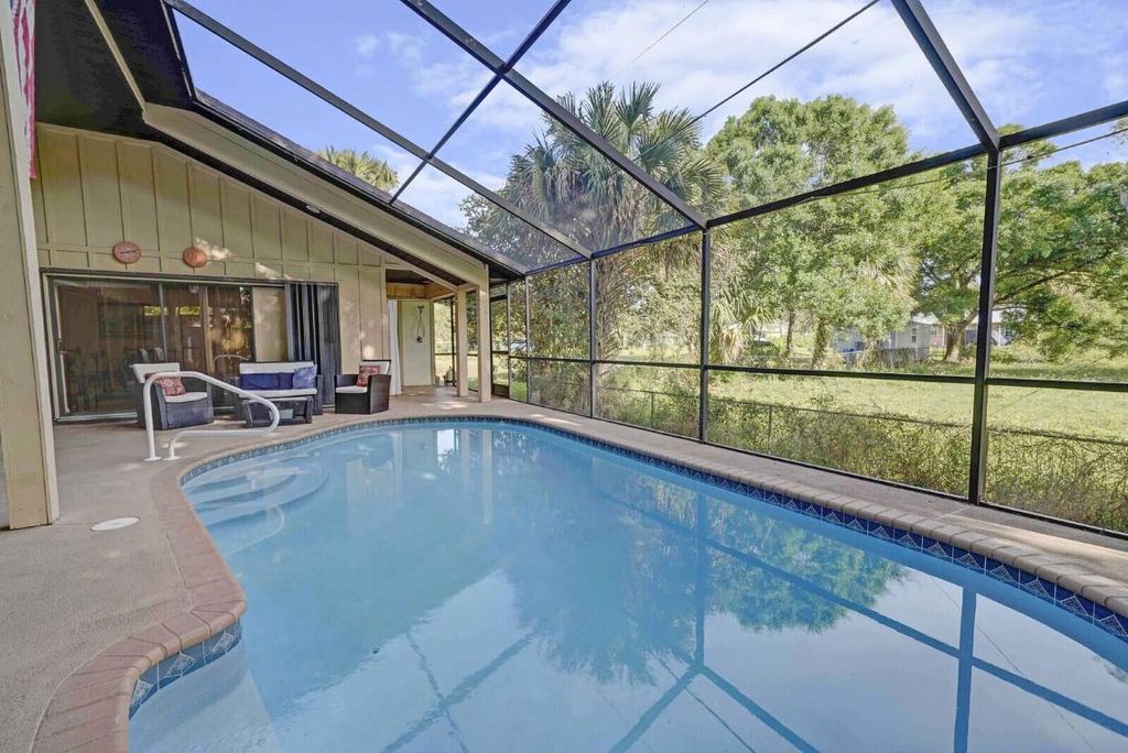 Photo of 522 SW Timber Trail, Stuart, FL 34997 (MLS # R10981484)