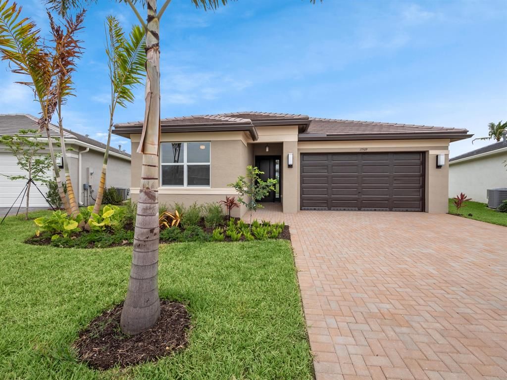 Photo of 13509 SW Oceanus Boulevard, Port St Lucie, FL 34987 (MLS # R10873186)