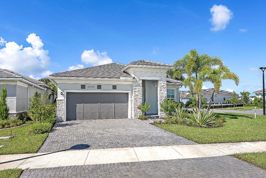 Photo of 10229 Riverstone Way, Palm Beach Gardens, FL 33412 (MLS # R11117454)