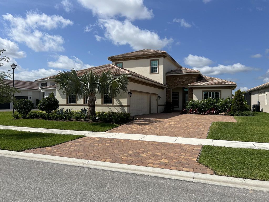 Photo of 9056 SW Pepoli Way, Port St Lucie, FL 34987 (MLS # R10885310)