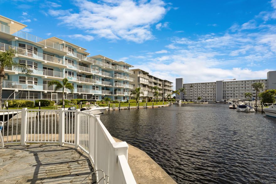 Here is your chance at waterfront living in paradise! This beautifully remodeled one-bedroom condo offers peaceful water views that make every day feel like a getaway. The open kitchen is an entertainer's dream, featuring all new cabinets, a stylish glass backsplash, Quartz countertops, and a dedicated beverage nook. Luxury vinyl floors throughout, a spacious walk-in closet, and a remodeled bathroom are some of the great features of this unit. Enjoy the open balcony that overlooks the canal and marina, complete with a new seawall. Free boat dockage is available when space permits, making it ideal for boat enthusiasts with direct Intracoastal access. The building has completed concrete restoration and painting. Enjoy access to 2 pools, a putting green and a park on the Intracoastal.