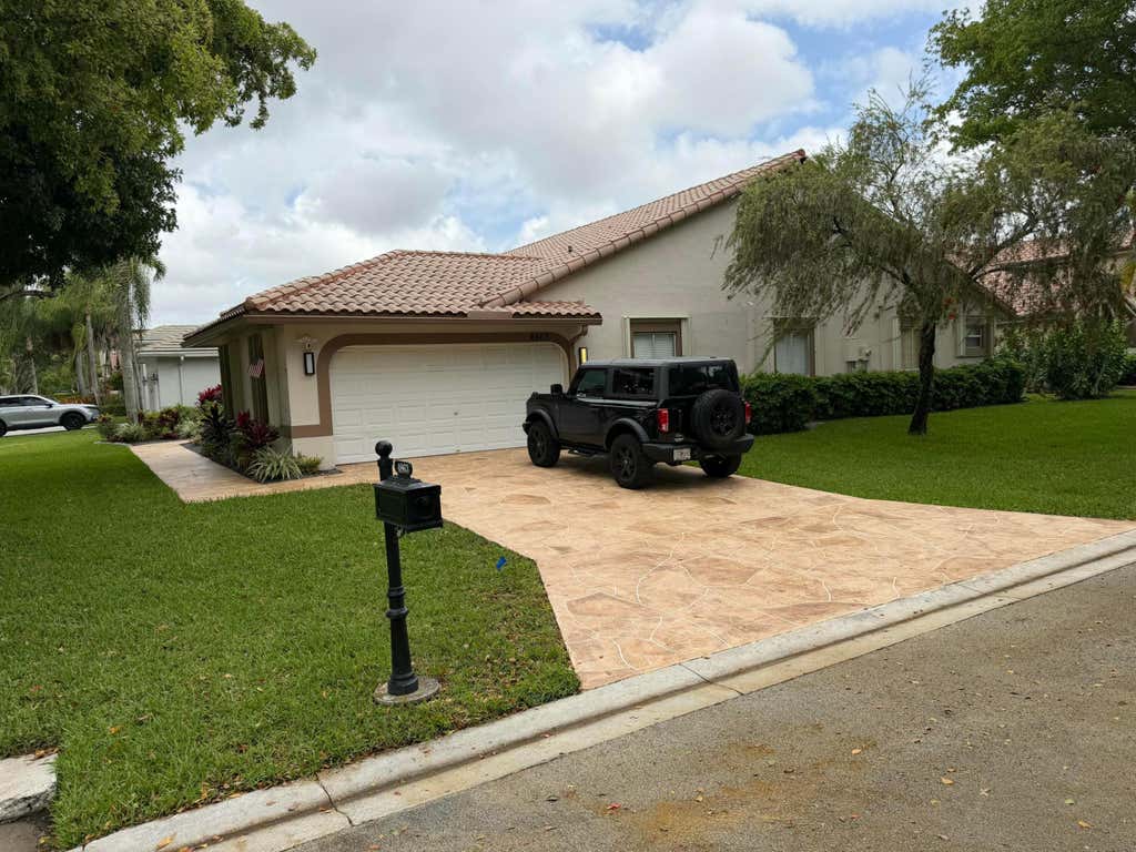 Photo of 4863 Chardonnay Drive, Coral Springs, FL 33067 (MLS # B26047756)