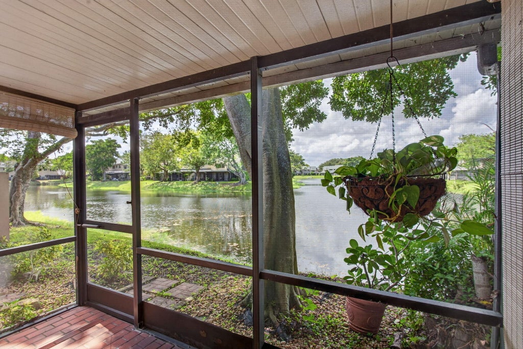 Photo of 1991 Discovery Circle E, Deerfield Beach, FL 33442 (MLS # B26087290)